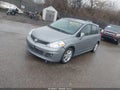 2012 Nissan Versa — photo 2 of 11 | VIN 3N1BC1CP6CK283714
