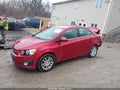 2015 Chevrolet Sonic — photo 2 of 11 | VIN 1G1JC5SH8F4161931