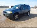 2005 Ford Escape — photo 2 of 11 | VIN 1FMYU93165KD99150