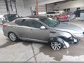 2015 Kia Optima — photo 13 of 16 | VIN 5XXGN4A77FG428108