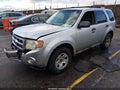 2009 Ford Escape — photo 2 of 11 | VIN 1FMCU93719KA92893