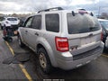 2009 Ford Escape — photo 3 of 11 | VIN 1FMCU93719KA92893