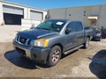2013 Nissan Titan — photo 6 of 19 | VIN 1N6BA0EK8DN305722