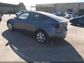 2023 Tesla Model Y — photo 3 of 20 | VIN 7SAYGDEE7PF928378