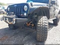 2014 Jeep Wrangler Unlimited — photo 17 of 18 | VIN 1C4BJWDG3EL258017