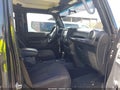 2014 Jeep Wrangler Unlimited — photo 5 of 18 | VIN 1C4BJWDG3EL258017
