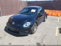 2016 Volkswagen Beetle — photo 2 of 16 | VIN 3VWF17AT3GM636053