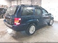 2004 Jeep Grand Cherokee — photo 4 of 11 | VIN 1J4GX58NX4C227105