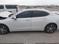 2015 Acura TLX — photo 14 of 16 | VIN 19UUB1F58FA022658