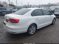 2015 Volkswagen Jetta — photo 4 of 17 | VIN 3VW1K7AJ8FM253181