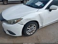2014 Mazda 3 — photo 6 of 12 | VIN JM1BM1L70E1111435