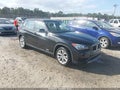 2014 BMW X1 — photo 1 of 13 | VIN WBAVL1C5XEVY16733