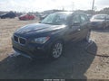 2014 BMW X1 — photo 2 of 13 | VIN WBAVL1C5XEVY16733