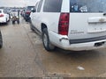 2011 Chevrolet Suburban 1500 — photo 6 of 12 | VIN 1GNSCHE04BR398150