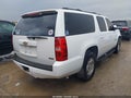 2011 Chevrolet Suburban 1500 — photo 4 of 12 | VIN 1GNSCHE04BR398150
