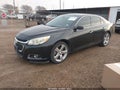 2015 Chevrolet Malibu — photo 2 of 16 | VIN 1G11G5SX3FF235191