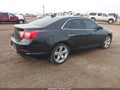 2015 Chevrolet Malibu — photo 4 of 16 | VIN 1G11G5SX3FF235191