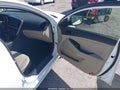 2014 Kia Optima — photo 5 of 11 | VIN 5XXGM4A71EG299140