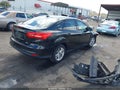 2015 Ford Focus — photo 4 of 17 | VIN 1FADP3F28FL345717