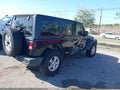 2018 Jeep Wrangler Unlimited — photo 4 of 16 | VIN 1C4HJXDN1JW145495