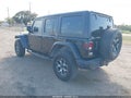 2021 Jeep Wrangler Unlimited — photo 3 of 16 | VIN 1C4HJXFG1MW543065