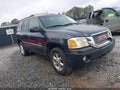 2006 GMC Envoy — photo 1 of 14 | VIN 1GKDS13S562141792