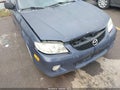 2002 Mazda Protege — photo 12 of 12 | VIN JM1BJ245421572340