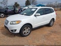 2012 Hyundai Santa Fe — photo 2 of 11 | VIN 5XYZH4AG8CG110201