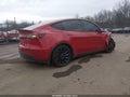 2023 Tesla Model Y — photo 4 of 18 | VIN 7SAYGDEF6PF795640