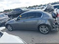 2015 Infiniti Q40 — photo 13 of 15 | VIN JN1CV6AP3FM500607