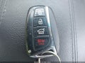2014 Hyundai Santa Fe — photo 11 of 16 | VIN 5XYZW3LA6EG226427
