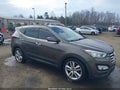 2014 Hyundai Santa Fe — photo 1 of 16 | VIN 5XYZW3LA6EG226427