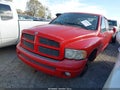 2003 Dodge Ram 1500 — photo 2 of 15 | VIN 1D7HU18N83J617602