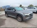 2019 Hyundai Santa Fe — photo 1 of 17 | VIN 5NMS23AD1KH086038
