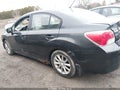 2014 Subaru Impreza — photo 15 of 17 | VIN JF1GJAC6XEH014004