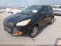 2013 Ford Escape — photo 2 of 10 | VIN 1FMCU0F77DUC61612