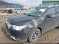 2015 Mitsubishi Outlander — photo 6 of 16 | VIN JA4JZ4AX4FZ008419