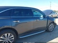 2016 Acura MDX — photo 13 of 16 | VIN 5FRYD3H40GB014006