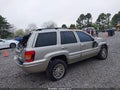 2003 Jeep Grand Cherokee — photo 4 of 11 | VIN 1J8GX58S03C531076