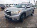 2015 Toyota Highlander — photo 2 of 15 | VIN 5TDKKRFHXFS108023