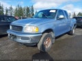 1998 Ford F-150 — photo 2 of 12 | VIN 1FTZX08W4WKA49453