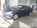 2011 Hyundai Sonata — photo 2 of 13 | VIN 5NPEC4AC8BH301652
