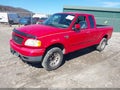 2002 Ford F-150 — photo 2 of 12 | VIN 1FTRX18W72NB17808