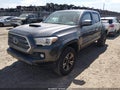 2016 Toyota Tacoma — photo 2 of 16 | VIN 5TFAZ5CN3GX006889