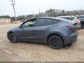 2023 Tesla Model Y — photo 13 of 15 | VIN 7SAYGDEE5PF918609