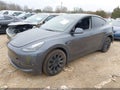 2023 Tesla Model Y — photo 2 of 15 | VIN 7SAYGDEE5PF918609