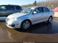 2010 Volkswagen Jetta — photo 2 of 12 | VIN 3VWRL7AJXAM084872