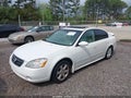 2003 Nissan Altima — photo 2 of 11 | VIN 1N4AL11D33C209342