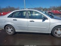 2004 Ford Focus — photo 13 of 16 | VIN 1FAFP38Z04W195519