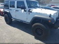 2014 Jeep Wrangler Unlimited — photo 1 of 17 | VIN 1C4BJWFG6EL163934